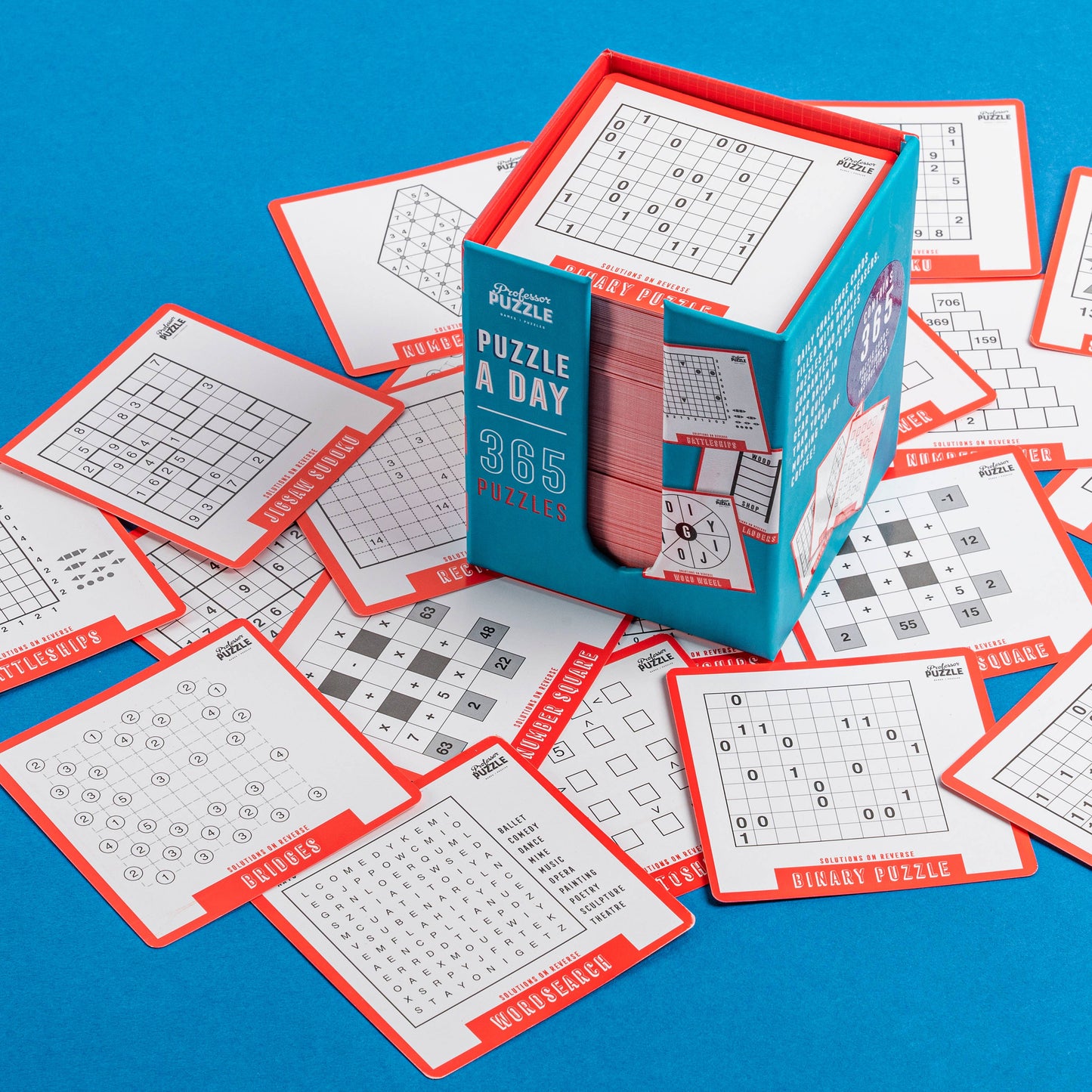 Puzzle cards with 'Puzzle a Day' box on a blue background