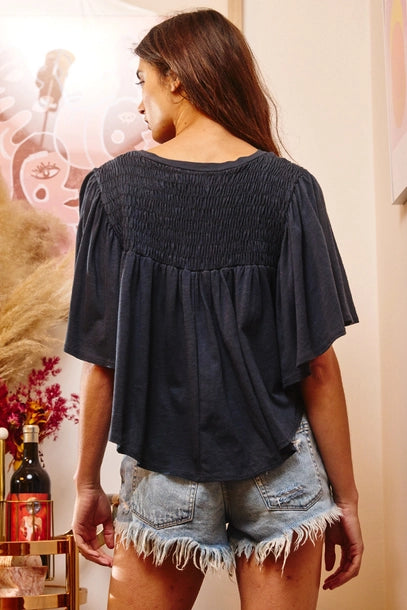 Flutter Sleeve Smocked Yoke V Shape Hem Top