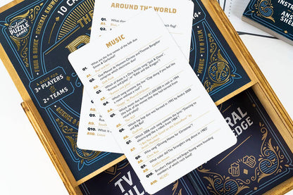 Card game with question cards and a decorative box on a white background