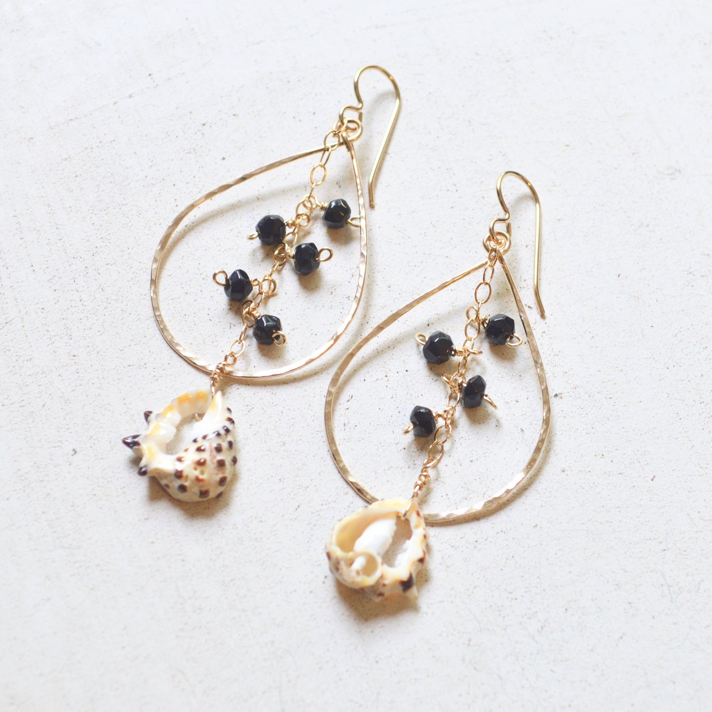 Salty But Sweet - Black Onyx & Drupa Shell Teardrop Earrings in Gold